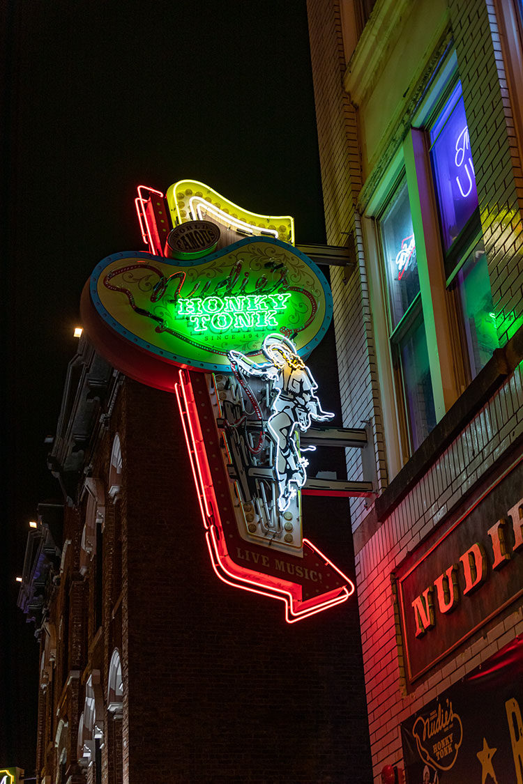 neon green honkey tonk sign