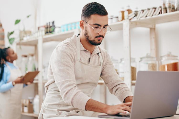 Business owner using a laptop